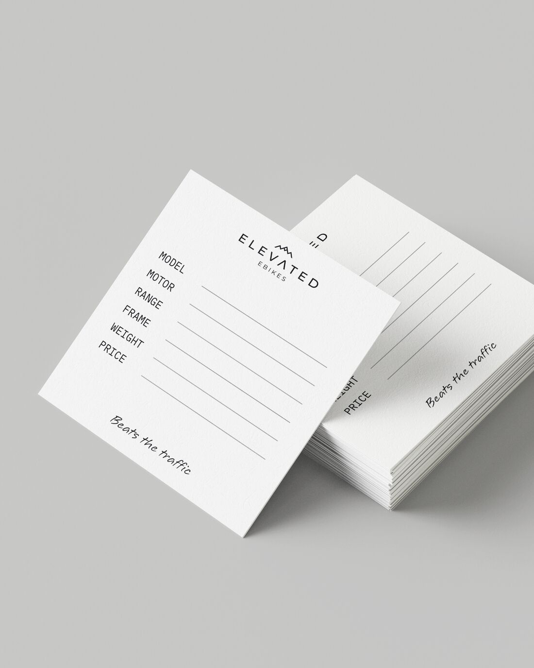 Front of the Elevated Ebikes price tag: the logo over printed write-in lines for model, motor, range, frame, weight and price, with a handwritten-style line at the bottom